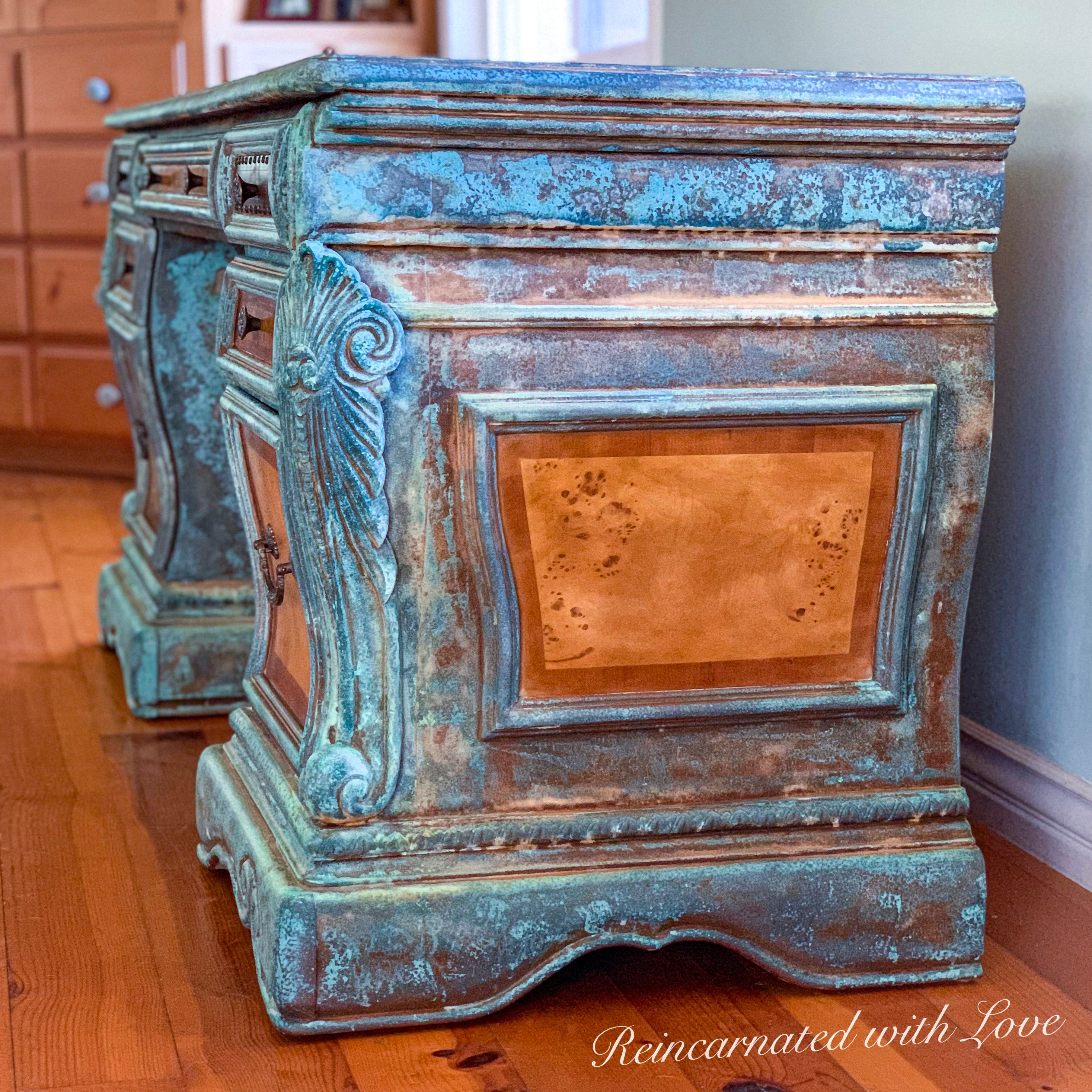 Side view of a boho desk, showing the art nouveau style, wood carved accents & stained, wood inlay.