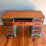 A boho style vintage wood desk with iridescent honeycomb & tiny bees burnt into the wood grain.