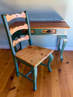 A vintage desk & matching chair done in stained wood with green trim, iridescent honeycomb & tiny bee accents.