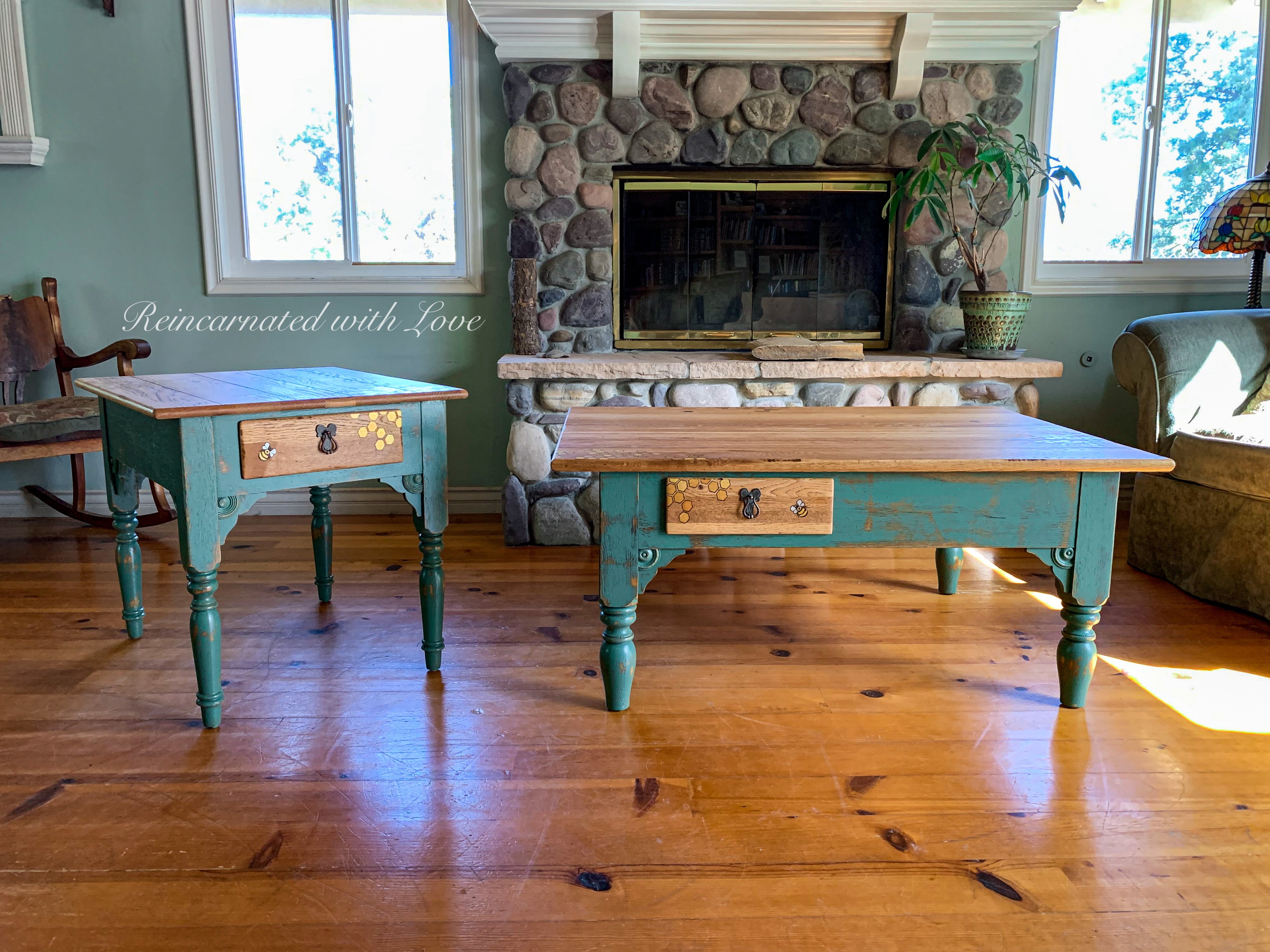 Matching coffee table and end table in distressed green and stained wood with honeycomb accents.