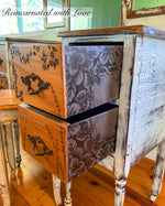 A close up of the drawers on the French country farmhouse style vanity showing the lace & floral accents on the drawer sides.