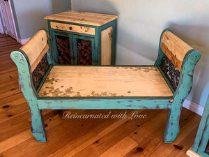 A wrought iron & wood bench shown with a matching nightstand, both with honeycomb & bee accents.